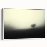 Framed canvas wall art featuring a serene misty landscape design in soft gray and white tones, displayed from a side view to highlight its elegant frame and depth.