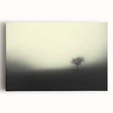 Stretched canvas artwork showcasing a serene misty landscape with soft fog enveloping distant mountains, perfect for home decor and tranquility in any space.