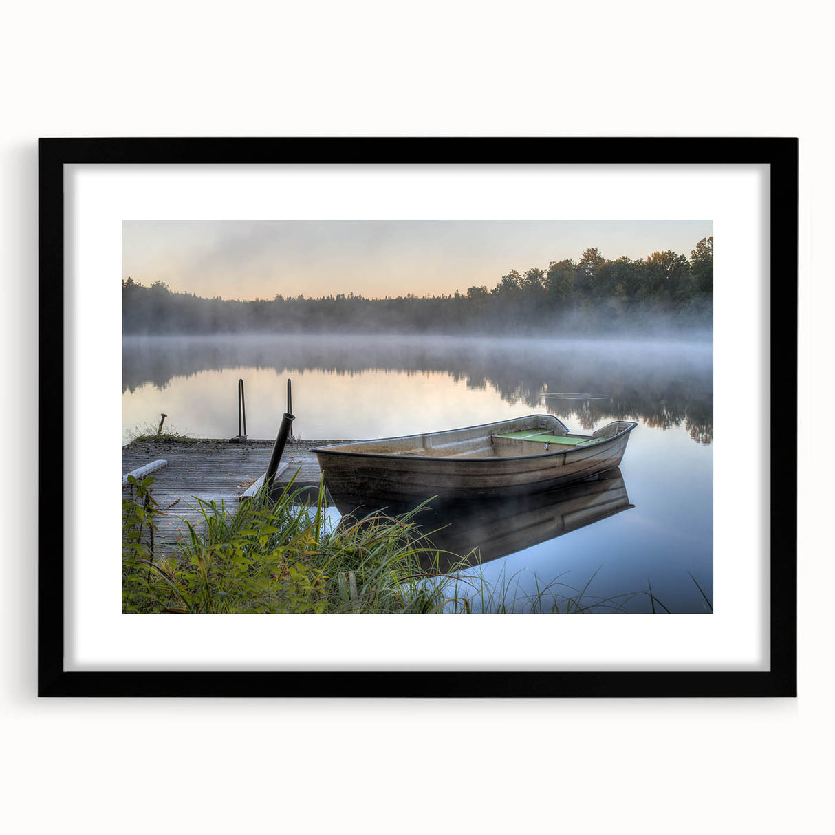 Framed wall art collection showcasing a serene landscape with mist and fog, featuring a sleek black frame and white mat, ideal for modern home decor.