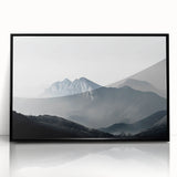 Framed wall art collection featuring a misty landscape design with soft fog, presented in a sleek black frame, ideal for modern home decor.