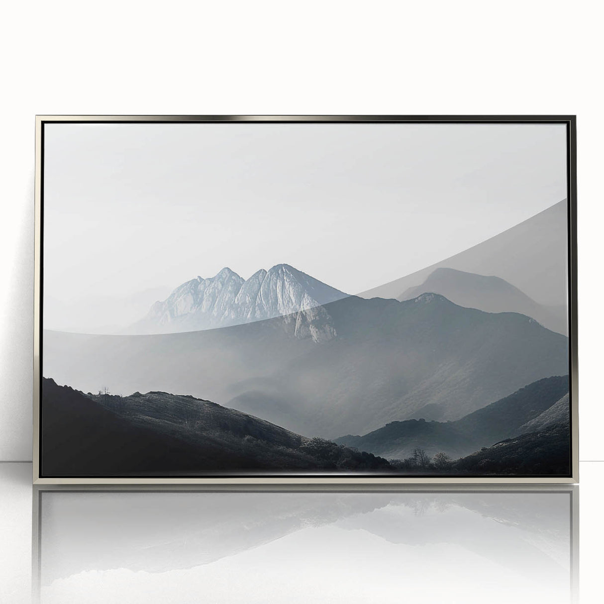 Framed acrylic wall art featuring a serene landscape design with mist and fog, showcasing silvery tones and a modern aesthetic, perfect for home decor.