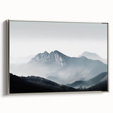 Framed canvas wall art showcasing a serene misty landscape with soft fog, featuring a silver frame that enhances its elegance, perfect for modern decor.