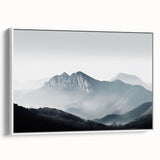 Framed canvas wall art showcasing a serene landscape design with mist and fog, featuring soft gray and white tones, perfect for adding tranquility to any room decor.
