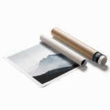 Rolled print featuring a serene landscape design with misty fog over a mountainous terrain, perfect for home decor, showcasing calming colors and details.