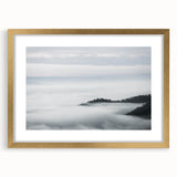 Framed wall art collection featuring a misty landscape design with a gold mat, ideal for modern home decor. The artwork presents a serene, foggy scene that adds elegance to any room.