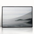 Framed acrylic wall art showcasing a serene landscape design shrouded in mist, featuring soft gray and white tones, perfect for modern home decor.