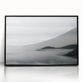 Framed acrylic wall art showcasing a serene landscape design shrouded in mist, featuring soft gray and white tones, perfect for modern home decor.