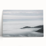 Stretched canvas wall art showcasing a misty landscape design with soft gray and blue hues, perfect for creating a serene atmosphere in modern home decor.