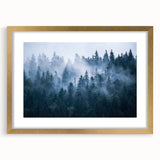 Framed wall art featuring a serene landscape design with mist and fog elements, elegantly presented in a gold frame with a mat, ideal for home decor.