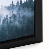 Close-up of a framed canvas wall art featuring a misty landscape design with soft gray and blue hues, ideal for enhancing home decor with a serene atmosphere.