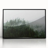 Framed acrylic wall art showcasing a serene landscape with mist and fog in soft gray and blue tones, perfect for modern home decor or office spaces.