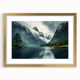 Framed wall art featuring a misty landscape design with soft hues of blue and gray, accented by a gold frame and mat, ideal for home decor enhancement.