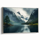 Framed canvas wall art showcasing a misty landscape design, featuring soft gray and silver tones, ideal for modern home decor, displayed from a side view.