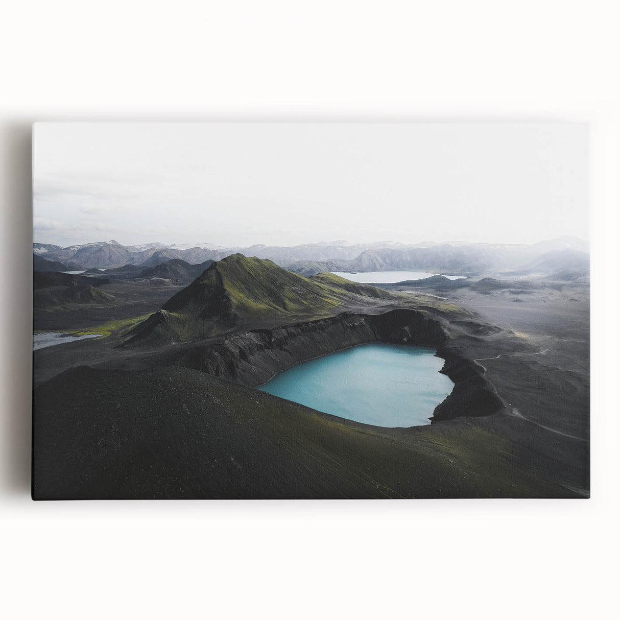 Stretched canvas artwork showcasing a serene landscape design enveloped in mist and fog, perfect for adding a calming atmosphere to any space.