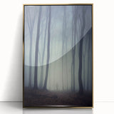 Framed acrylic wall art featuring a misty landscape design in soft hues of blue and gray, accented with a sleek gold frame, ideal for modern home decor.