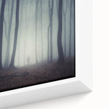 Close-up of a framed canvas wall art piece featuring a serene misty landscape with soft fog enveloping trees, ideal for enhancing home decor and creating a calming ambiance.
