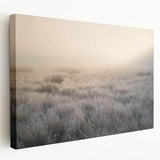 Stretched canvas wall art showcasing a serene misty landscape scene, featuring soft hues of blue and gray, perfect for enhancing home decor in living rooms or bedrooms.