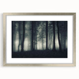 Framed landscape wall art design featuring misty fog over serene mountains, elegantly presented with a silver frame and mat, perfect for modern decor.