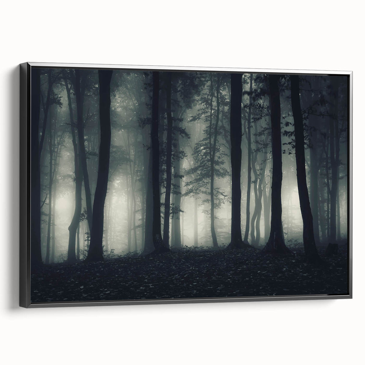 Framed canvas wall art featuring a misty landscape design, showcasing muted colors of gray and blue with a sleek black frame, ideal for modern decor.