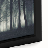 Framed canvas wall art depicting a serene misty landscape with soft fog enveloping trees, showcasing muted colors and a tranquil atmosphere, perfect for home decor.