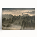 Stretched canvas wall art depicting a serene misty landscape with soft gray and blue tones, ideal for creating a calming atmosphere in any room.