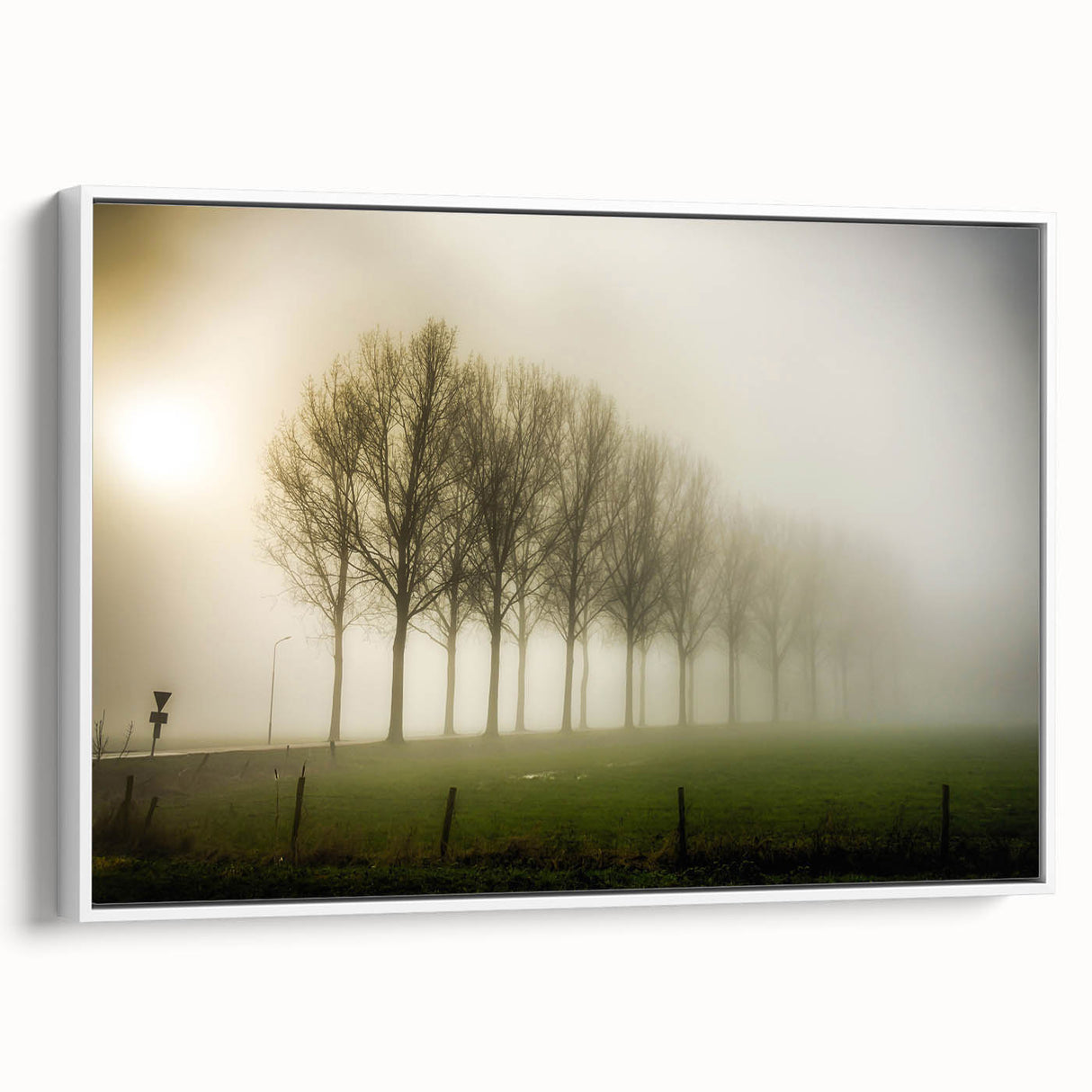 Framed canvas wall art featuring a misty landscape design in soft gray and white tones, showcasing a tranquil foggy scene, ideal for home decor.