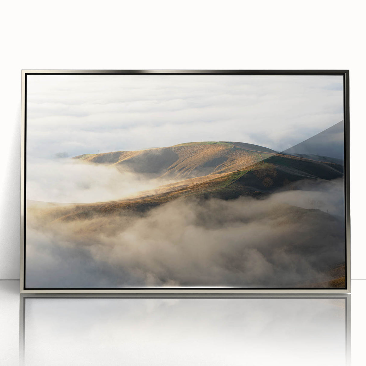 Framed acrylic wall art featuring a serene landscape design with mist and fog, showcasing soft colors and a silver frame, perfect for modern home decor.
