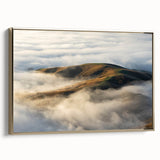 Framed canvas wall art featuring a serene landscape design with mist and fog, accented by a gold frame, perfect for enhancing home decor with a touch of elegance.