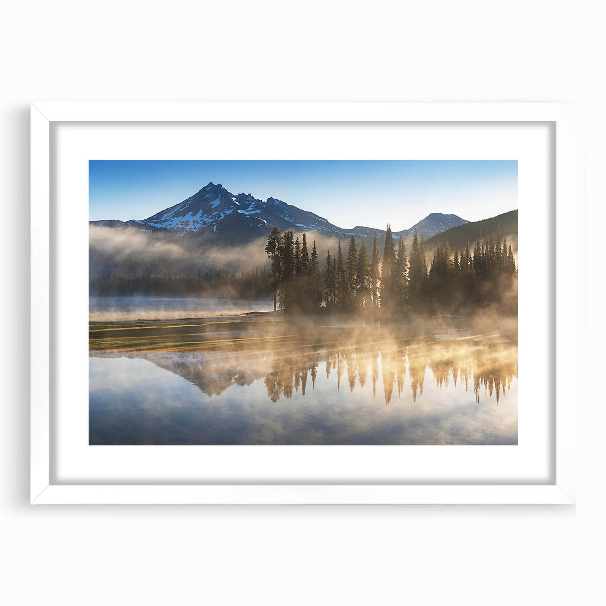 Framed wall art collection showcasing a serene landscape design with mist and fog, featuring a white mat and frame, perfect for enhancing home decor.