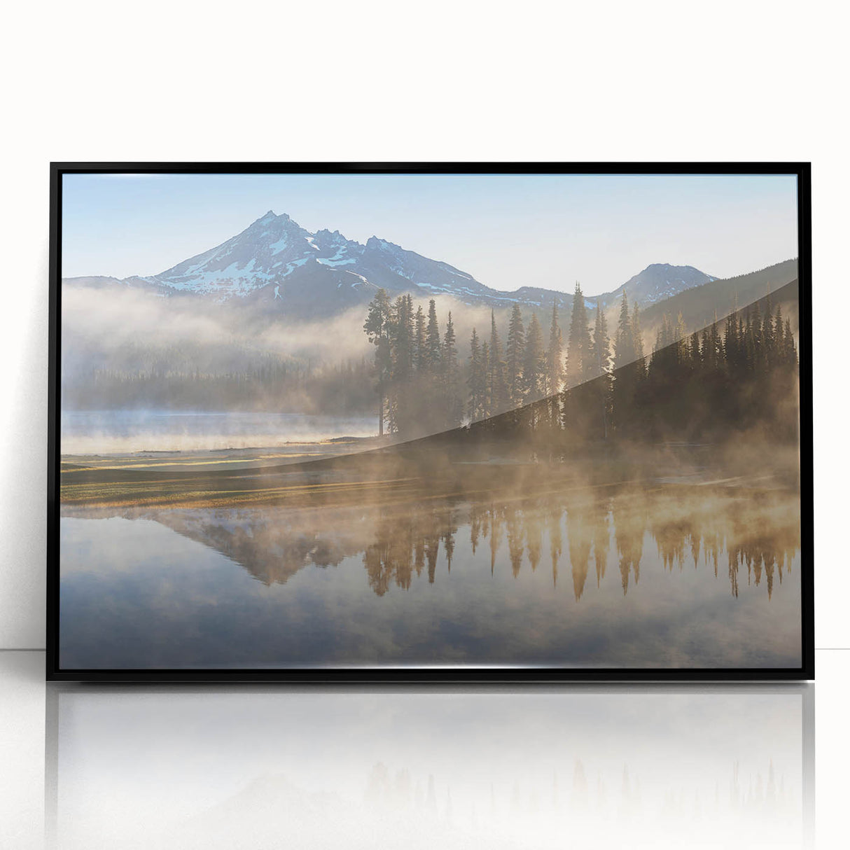 Framed acrylic wall art featuring a serene misty landscape with fog, showcased in a sleek black frame, ideal for modern home decor and enhancing tranquility.