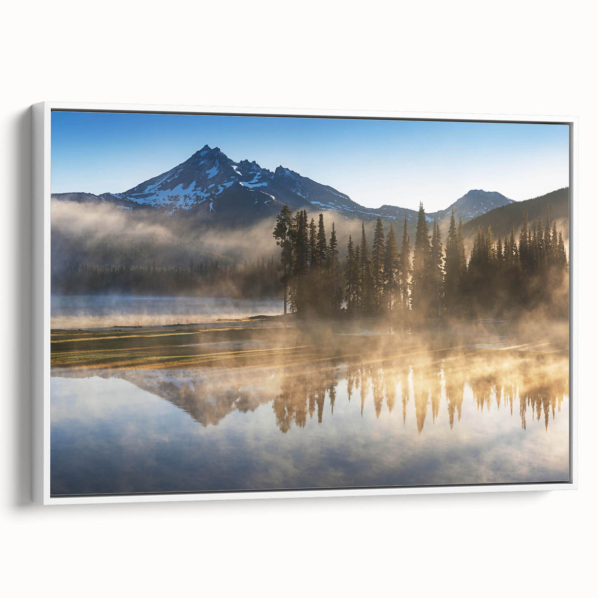 Framed wall art collection showcasing a serene landscape design with mist and fog, featuring soft colors and an elegant white frame, perfect for home decor.
