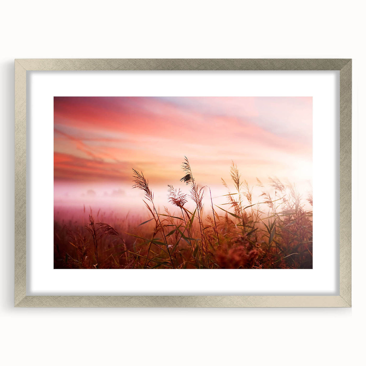 Framed wall art featuring a serene landscape design with mist and fog, displayed in a silver frame with matting, perfect for enhancing home decor aesthetics.