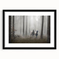 Framed wall art featuring a misty landscape design in a sleek black frame, showcasing serene hues of gray and blue, perfect for modern home decor.