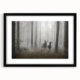 Framed wall art featuring a misty landscape design in a sleek black frame, showcasing serene hues of gray and blue, perfect for modern home decor.
