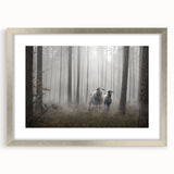 Framed wall art featuring a serene landscape design with mist and fog, presented in a stylish silver frame with a mat, ideal for enhancing home decor.