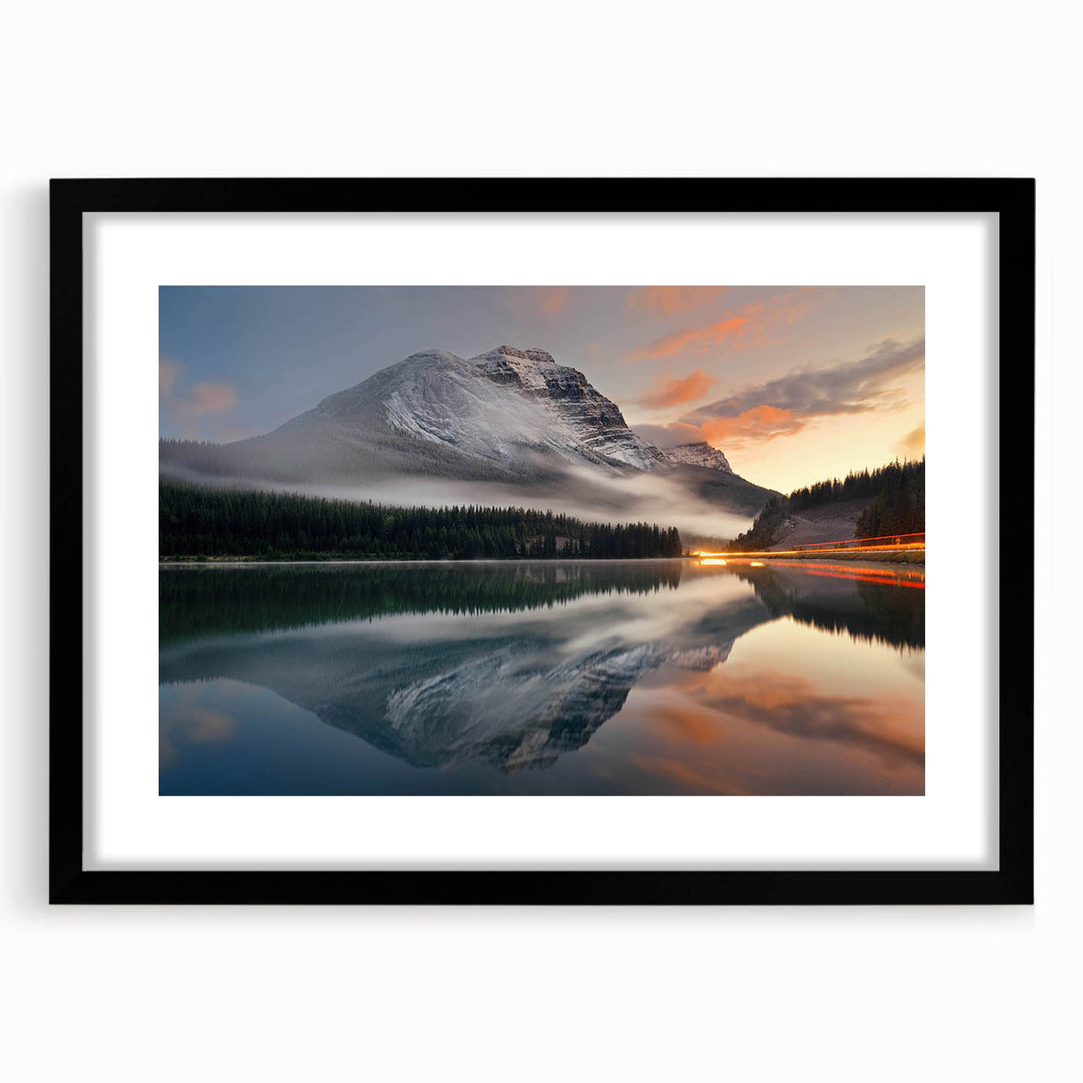Framed wall art collection showcasing a serene misty landscape with a black mat and sleek frame, perfect for enhancing home decor and adding tranquility to any space.