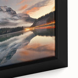 Framed canvas artwork showcasing a serene landscape shrouded in mist, highlighting soft gray and blue tones, perfect for tranquil home decor.