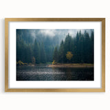 Framed wall art collection showcasing a misty landscape design with soft hues of blue and gray, accented by a gold frame and mat, perfect for modern home decor.