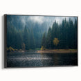 Framed canvas wall art showcasing a misty landscape with fog, featuring a sleek black frame. The artwork enhances modern interiors with its tranquil aesthetic.