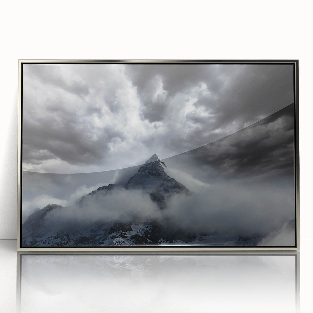Framed acrylic wall art showcasing a serene landscape design with mist and fog, elegantly presented in a sleek silver frame, perfect for modern decor.