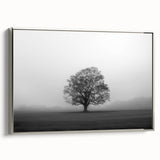 Framed canvas wall art showcasing a serene landscape design with mist and fog, highlighted by a silver frame; ideal for home decor and creating a calming ambiance.