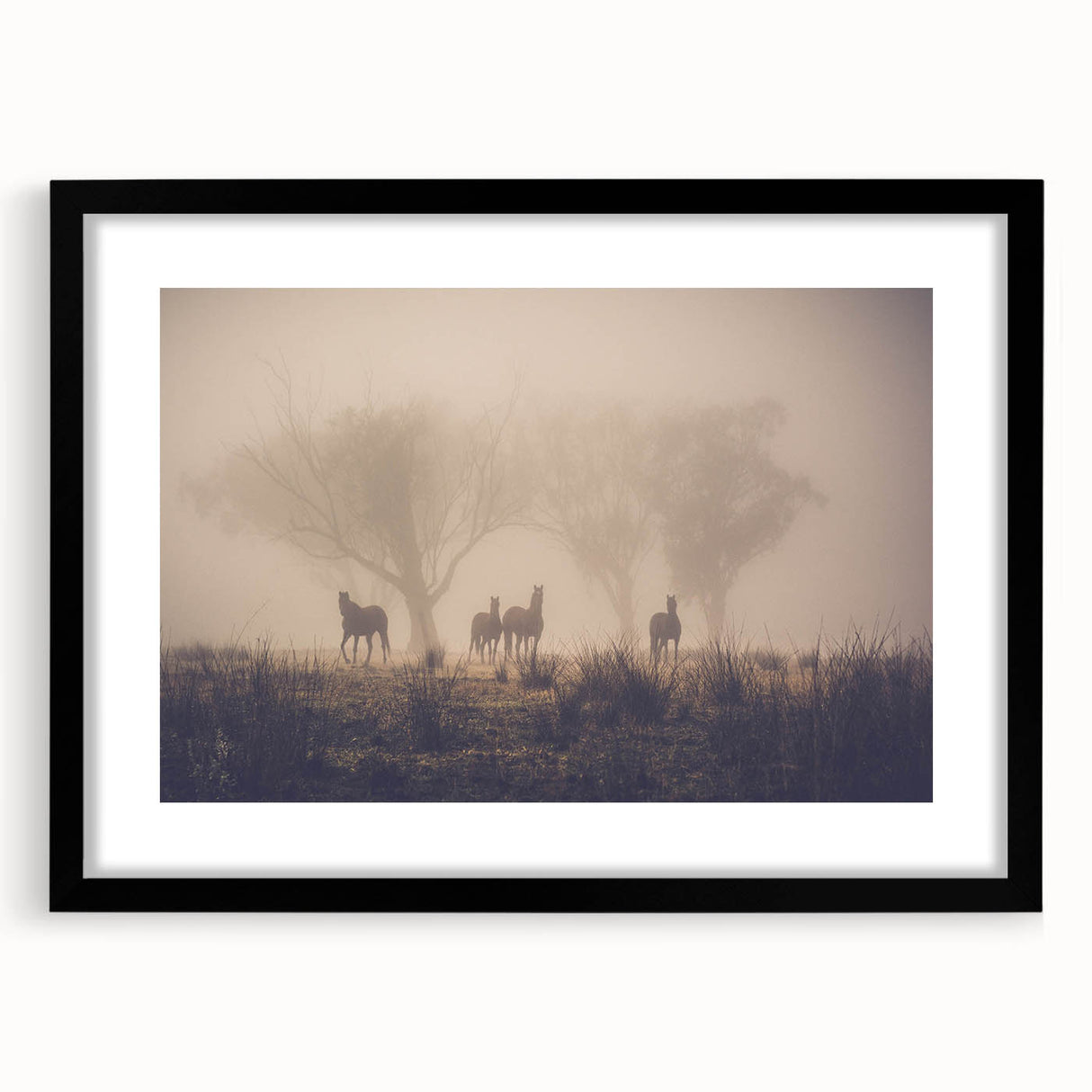 Framed wall art collection showcasing a misty landscape design, with a sleek black frame and mat, ideal for modern home decor and art enthusiasts.