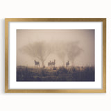 Framed wall art collection showcasing a serene landscape design with mist and fog, featuring a gold mat and frame, ideal for home decor enhancement.