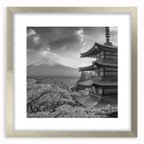 Framed wall art showcasing a serene mountain landscape design with a silver mat, ideal for home decor. Perfect for nature lovers and modern interiors.