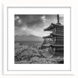 Framed wall art featuring a serene landscape of mountains in soft pastel colors, set in a white mat and frame, perfect for home decor and nature enthusiasts.