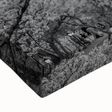 Close-up of a stretched canvas wall art piece depicting a serene mountain landscape with vibrant colors, perfect for home decor that complements nature-themed interiors.