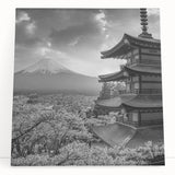 Stretched canvas wall art depicting a serene mountain landscape with vibrant colors, leaning against a wall, perfect for home decor and nature enthusiasts.