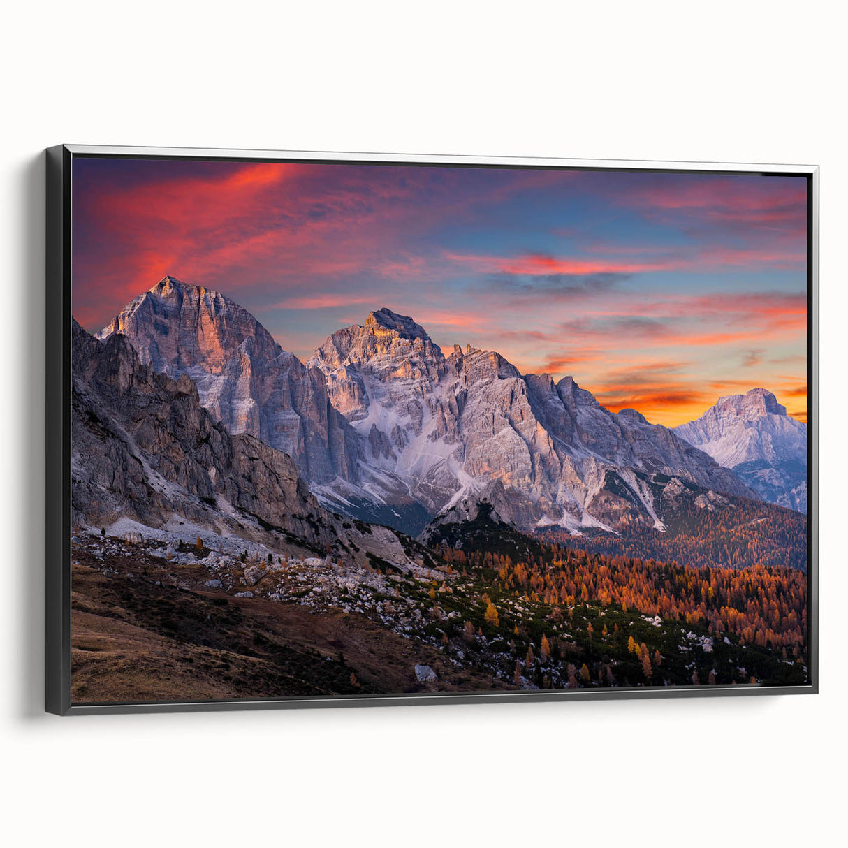 Framed canvas wall art showcasing a stunning mountain landscape with vibrant colors, featuring a sleek black frame, perfect for enhancing modern home decor.