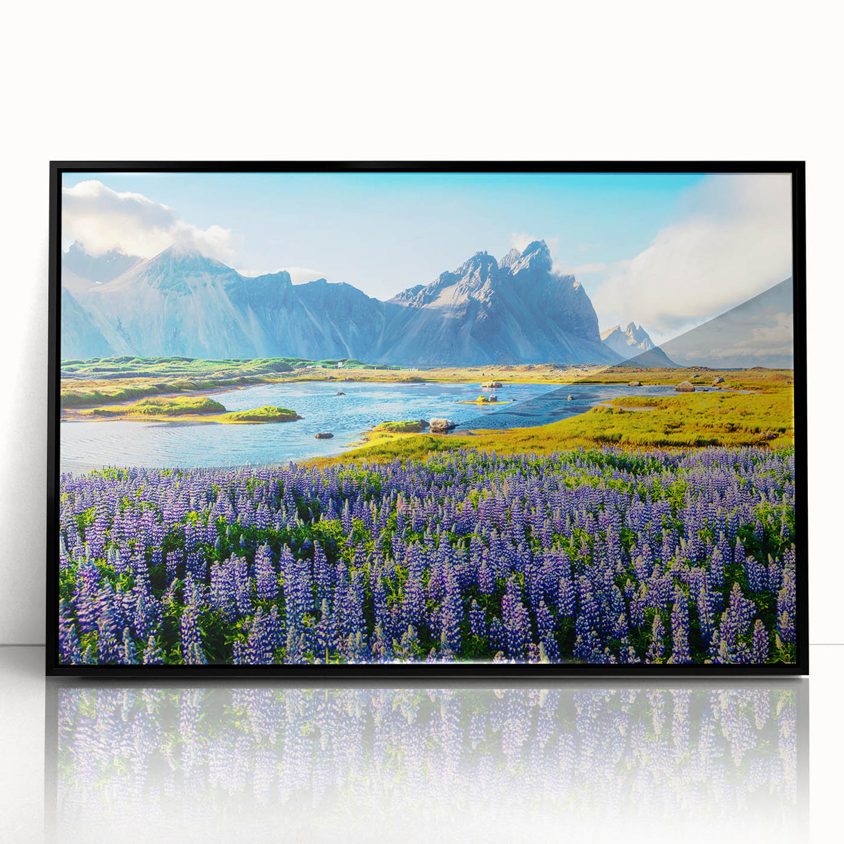 Framed wall art of majestic mountains in a minimalist black frame, showcasing vibrant colors and intricate details, perfect for enhancing any modern decor.