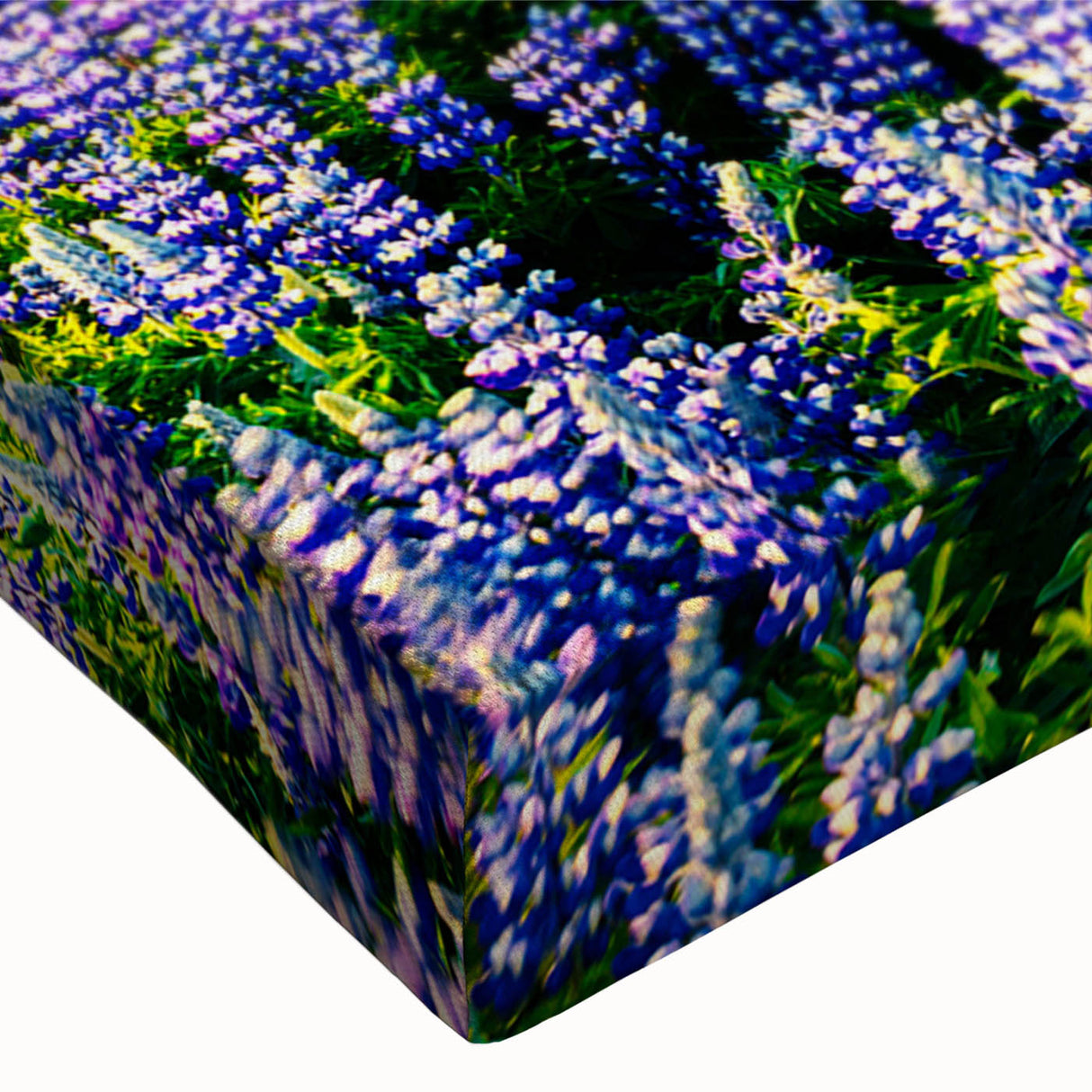 Close-up of a stretched canvas wall art piece showcasing a vibrant mountain landscape design, featuring rich colors and intricate details, perfect for home decor.
